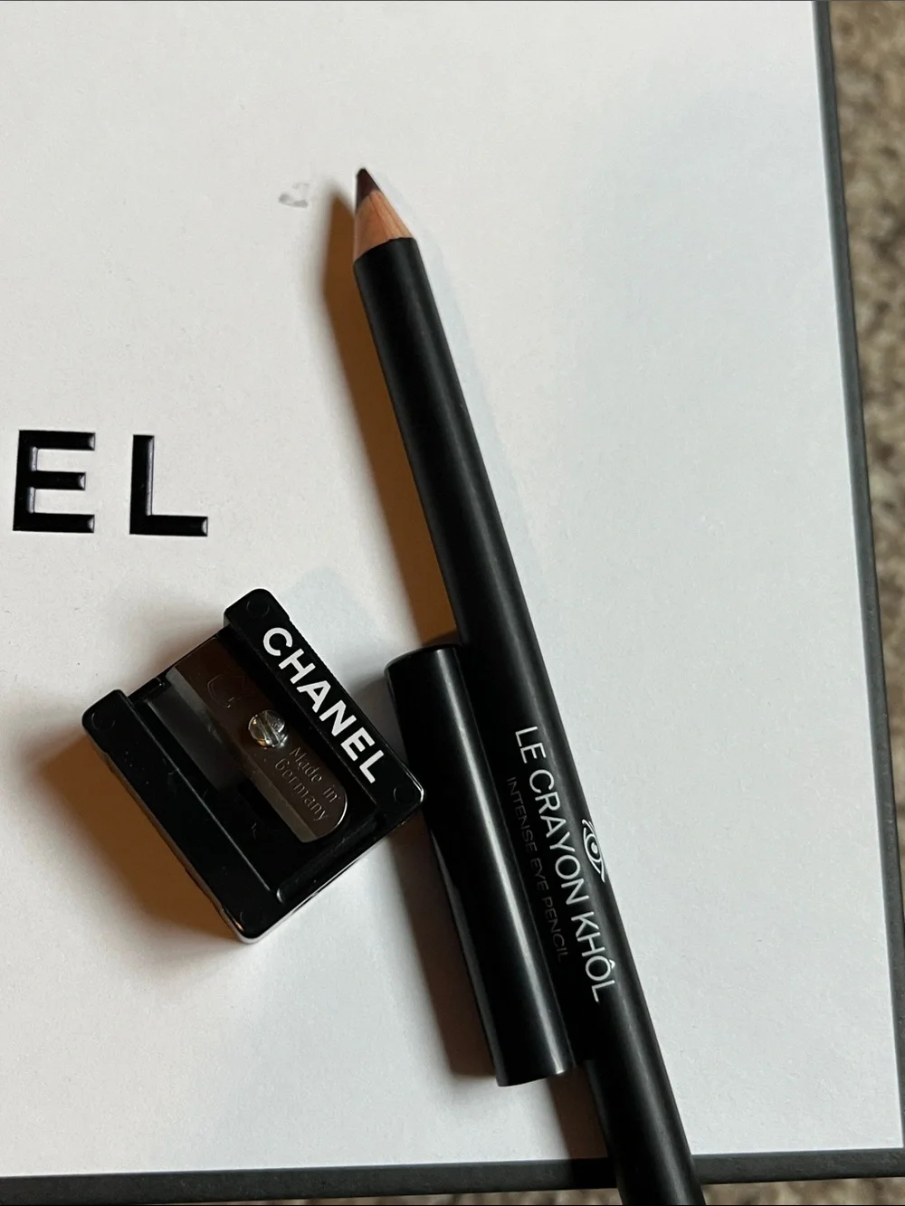 Chanel Pencil and Sharpener, brown color.